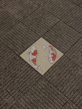 Japanese manhole cover with two crane birds motif 